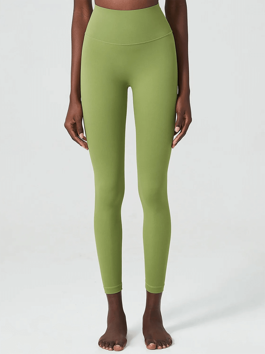 Stylish women's ankle-length yoga leggings in olive green, perfect for workouts and versatile activities.